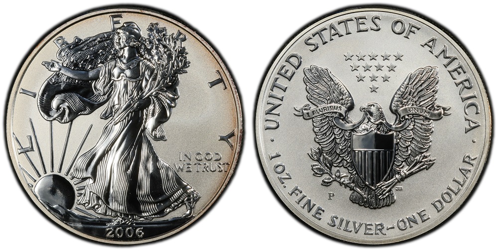Side-by-side comparison of 2006-W standard proof Silver Eagle (left) versus 2006-P Reverse Proof (right) showing contrasting surface finishes